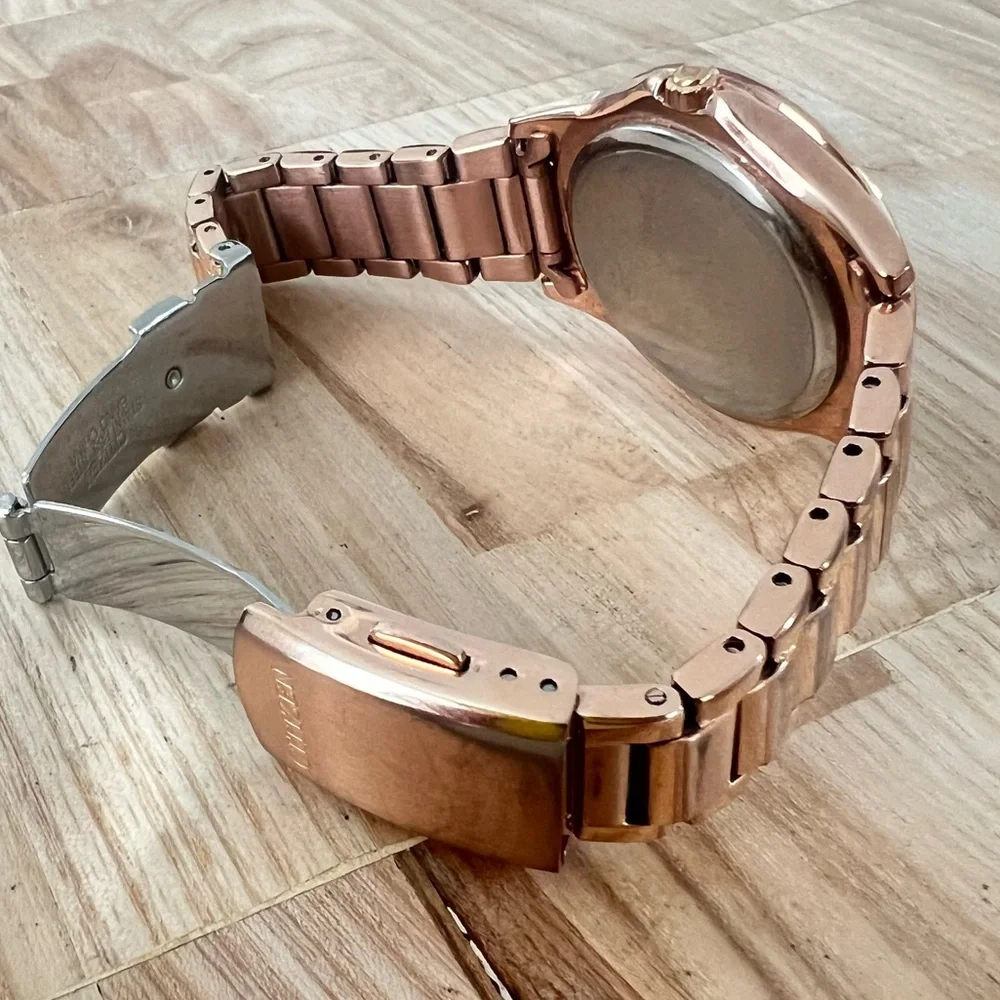 Citizen eco-drive ladies rose gold tone solar dress watch